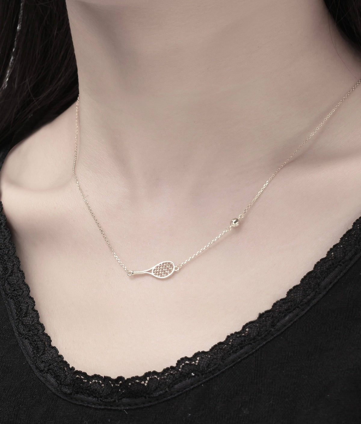 LoveMatch Tennis BABY ACE Silver Racquet and Ball Necklace on model