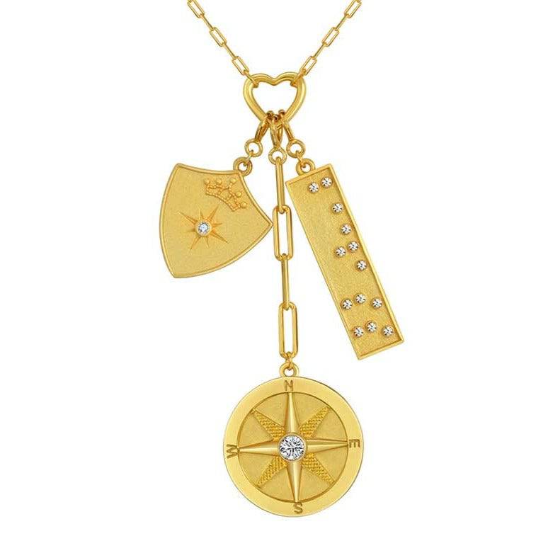 Saints and Saviors Protected Wanderer Necklace with Compass, Shield and Badass Braille Bar on Gold with Crystals