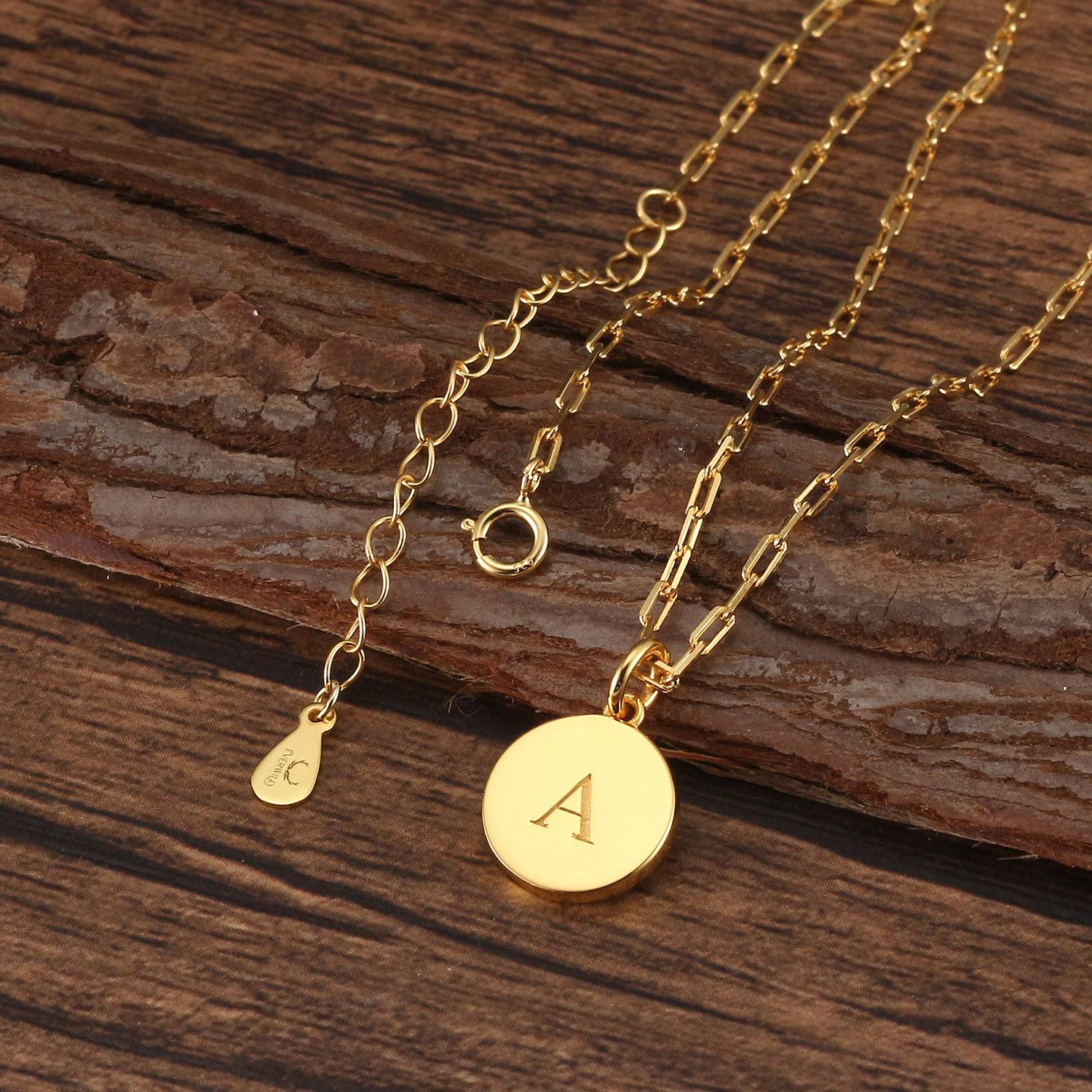 Saints and Saviors Dainty Fancy Initial Pendant Necklace modern letter A engraved on small gold disc