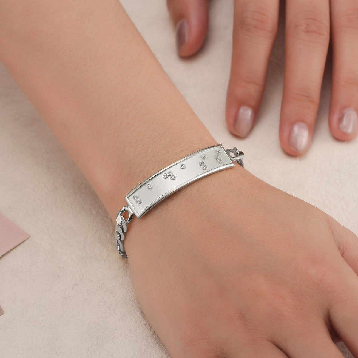 Touchstone Badass ID Link Bracelet in Silver in Braille Crystals on Model