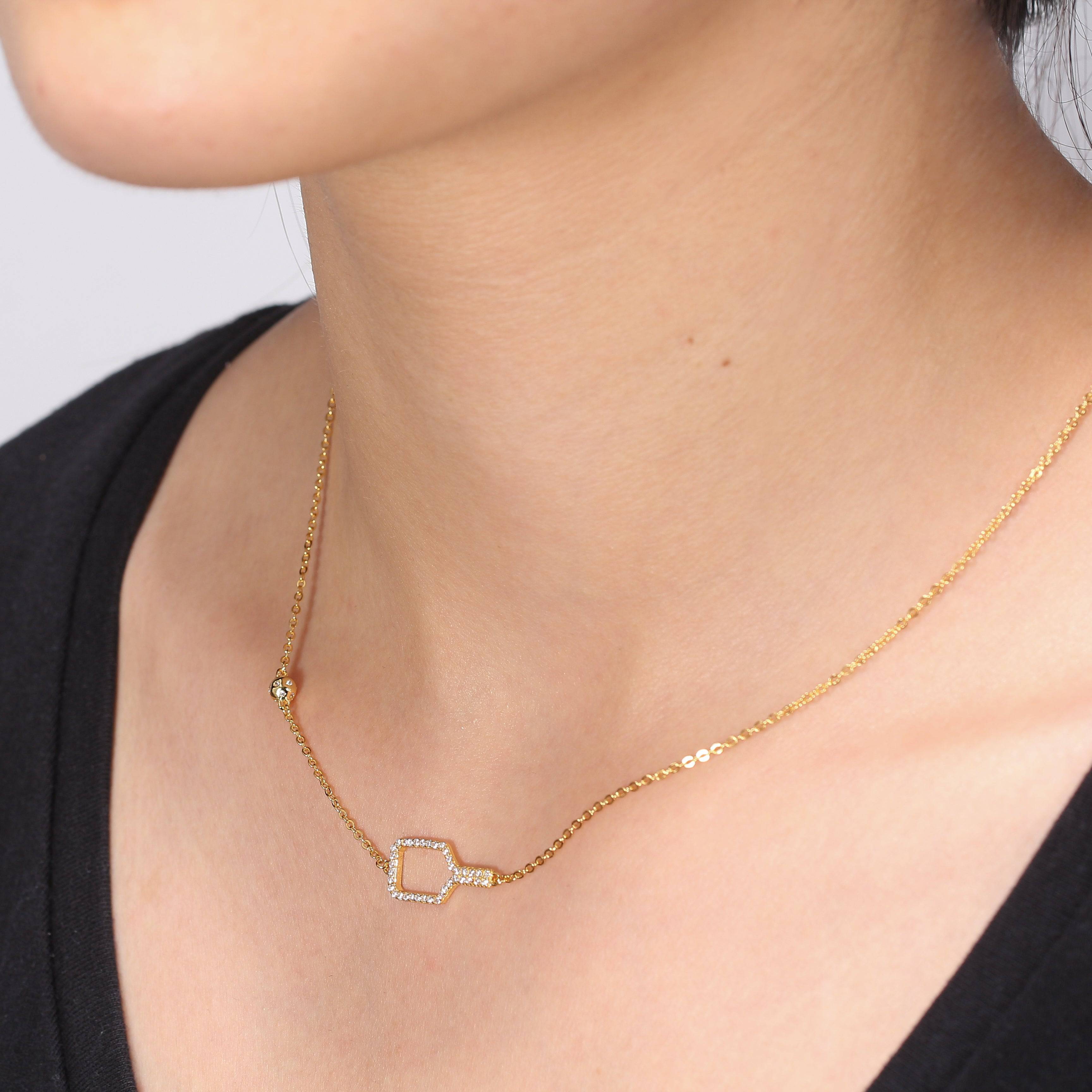 Pickleball Bella Bling Gold Paddle and Ball Necklace on Model