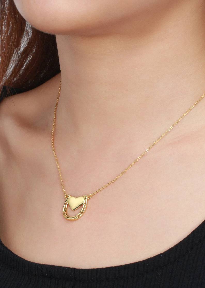 Saints and Saviors Capture My Heart Horseshoe Necklace Gold on model