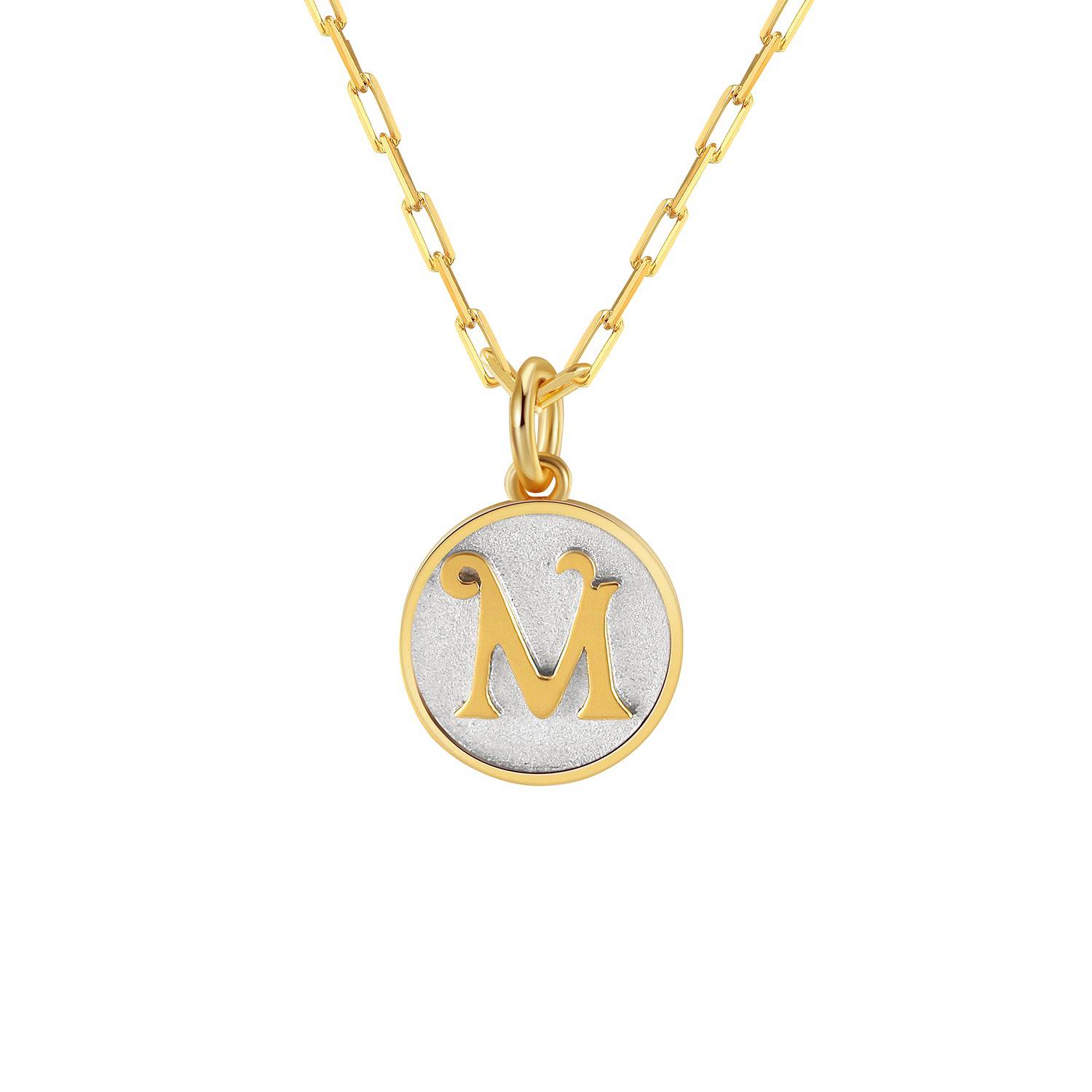Saints and Saviors Dainty Fancy Initial Pendant Necklace gold letter M on small silver disc