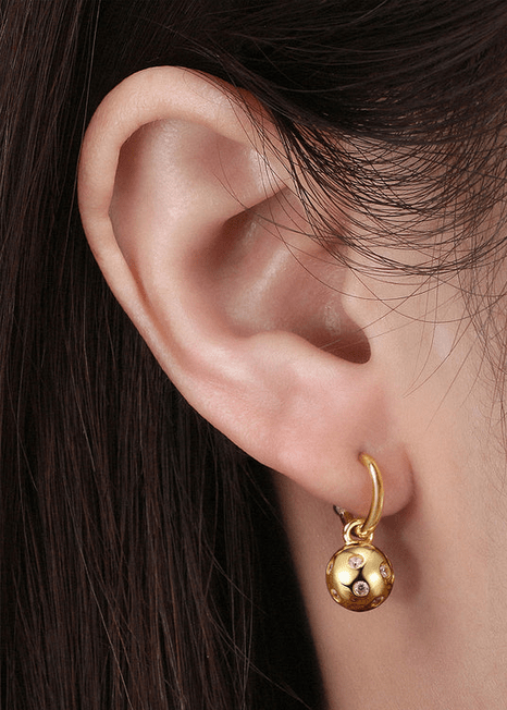 Pickleball Huggie Hoop Gold Earrings with Crystals on Model
