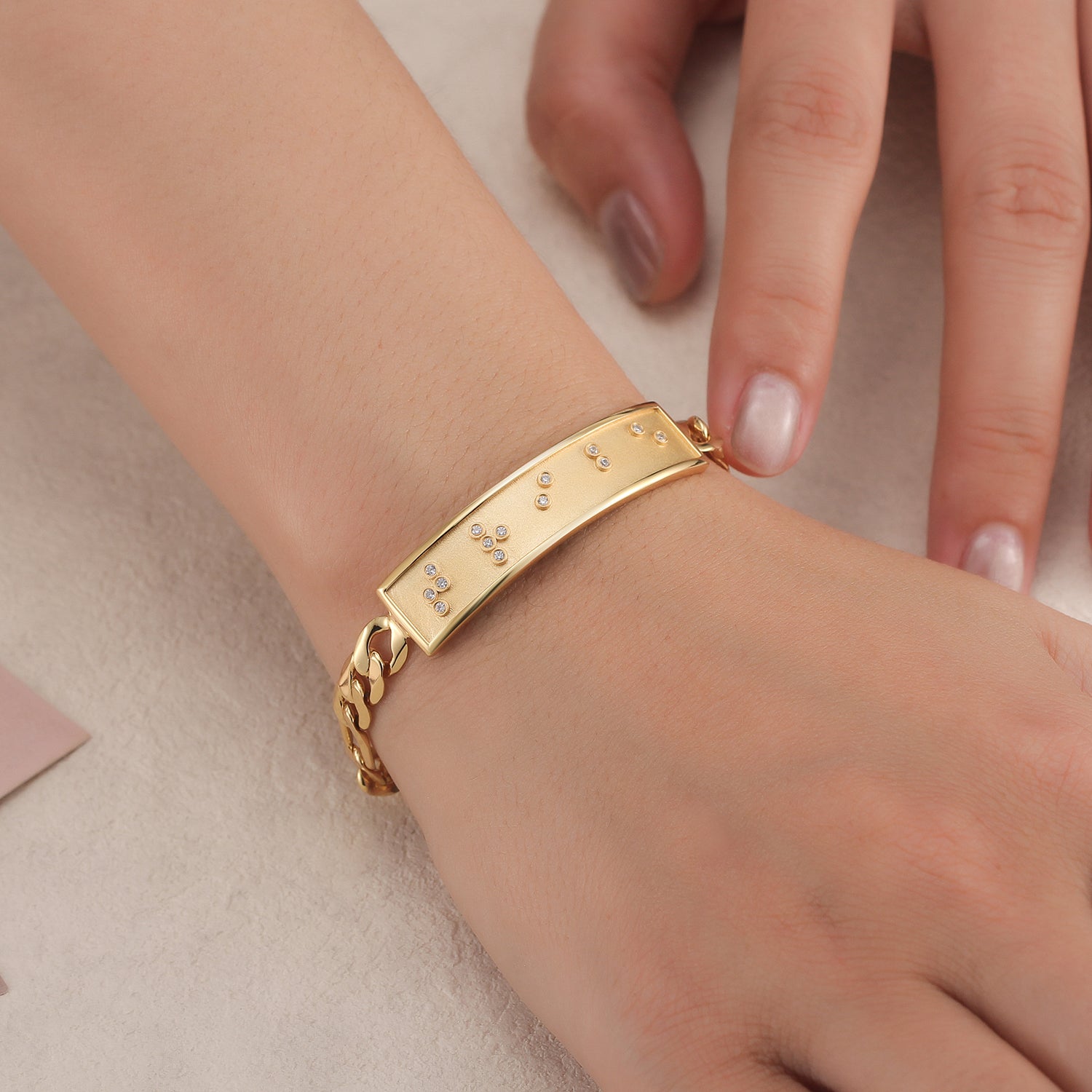 Touchstone 'Tribe' Braille Message in Crystals ID Link Bracelet in Gold on Model