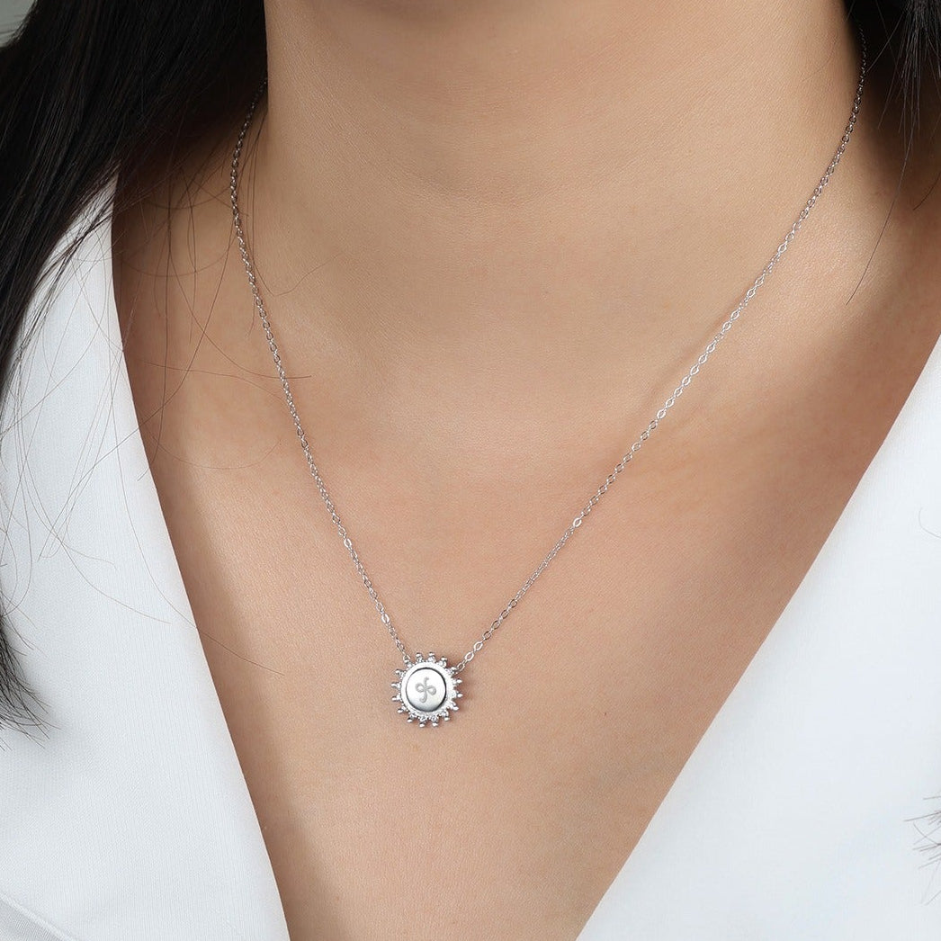 Silver Friendship necklace worn on a model