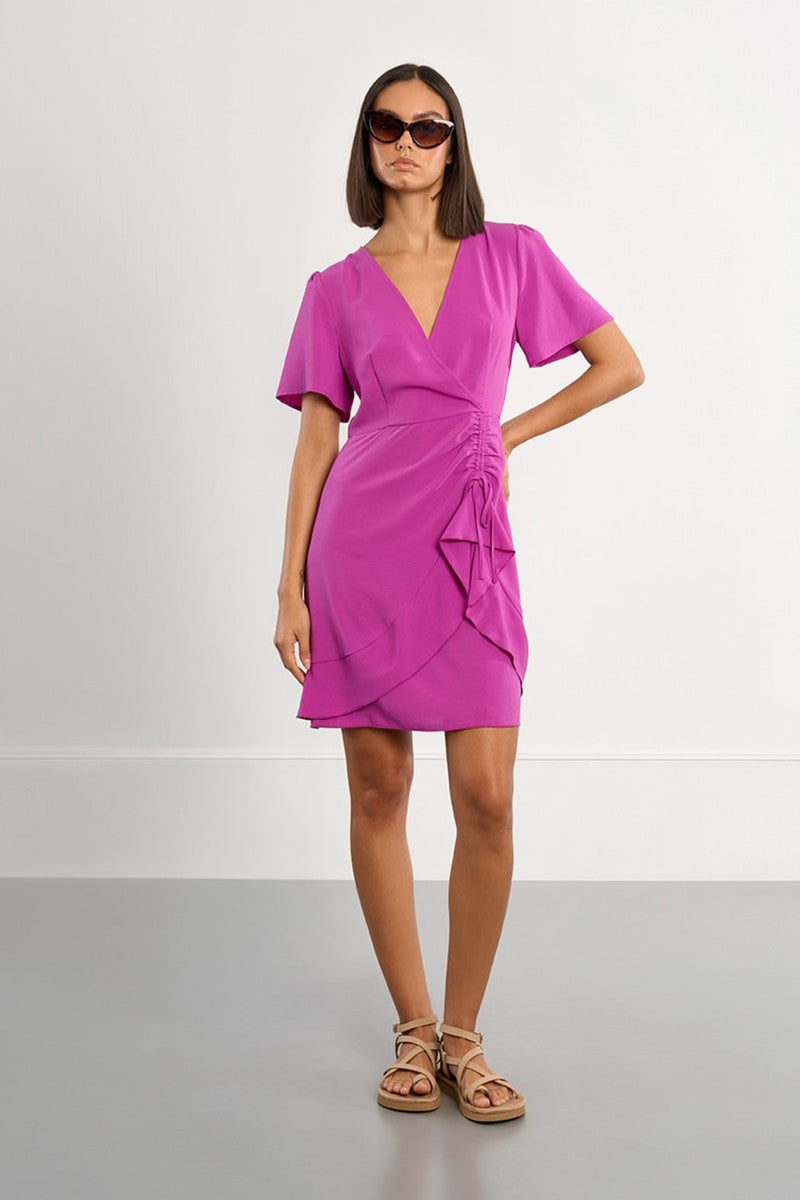 ASYMMETRICAL MINI DRESS