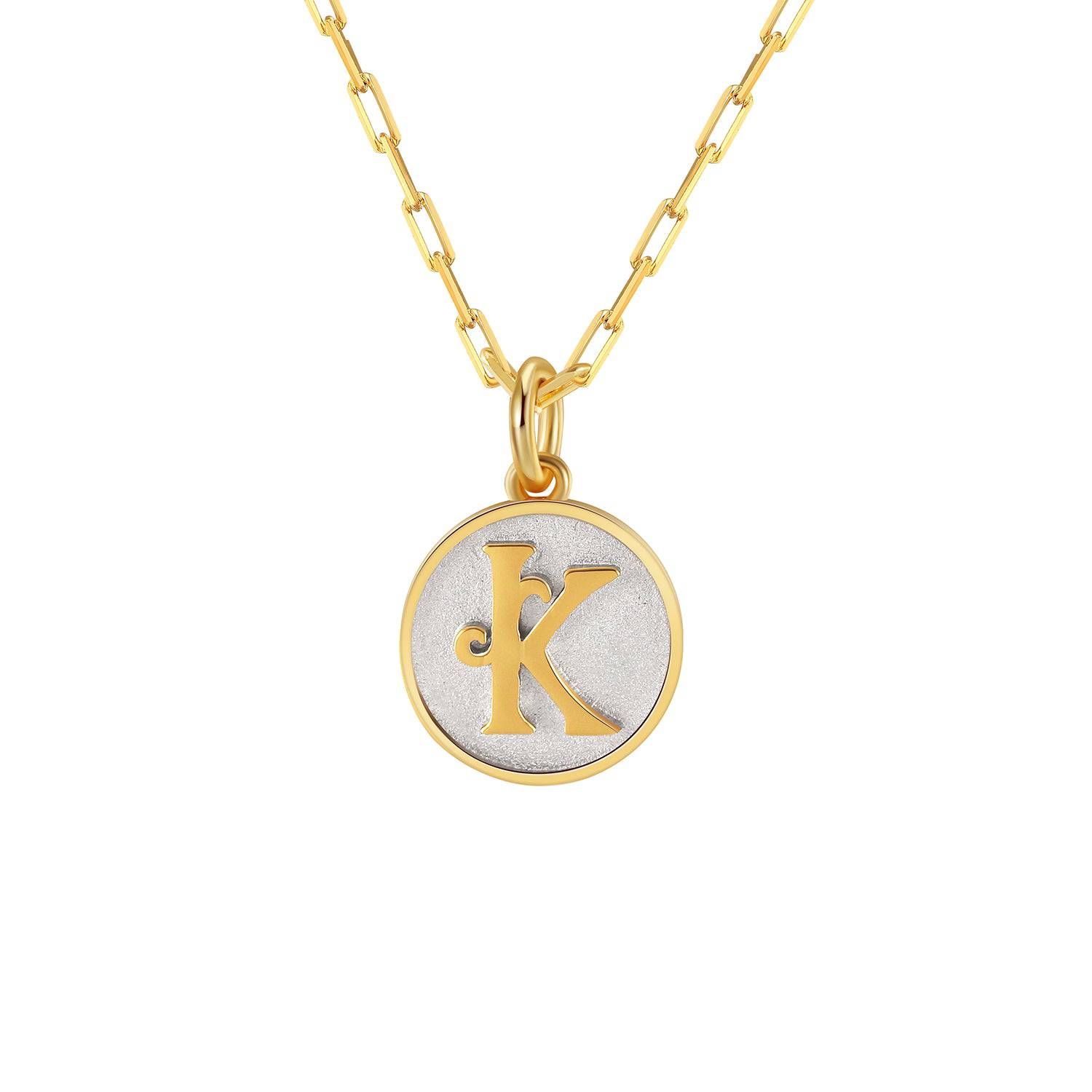 Saints and Saviors Dainty Fancy Initial Pendant Necklace gold letter K on small silver disc