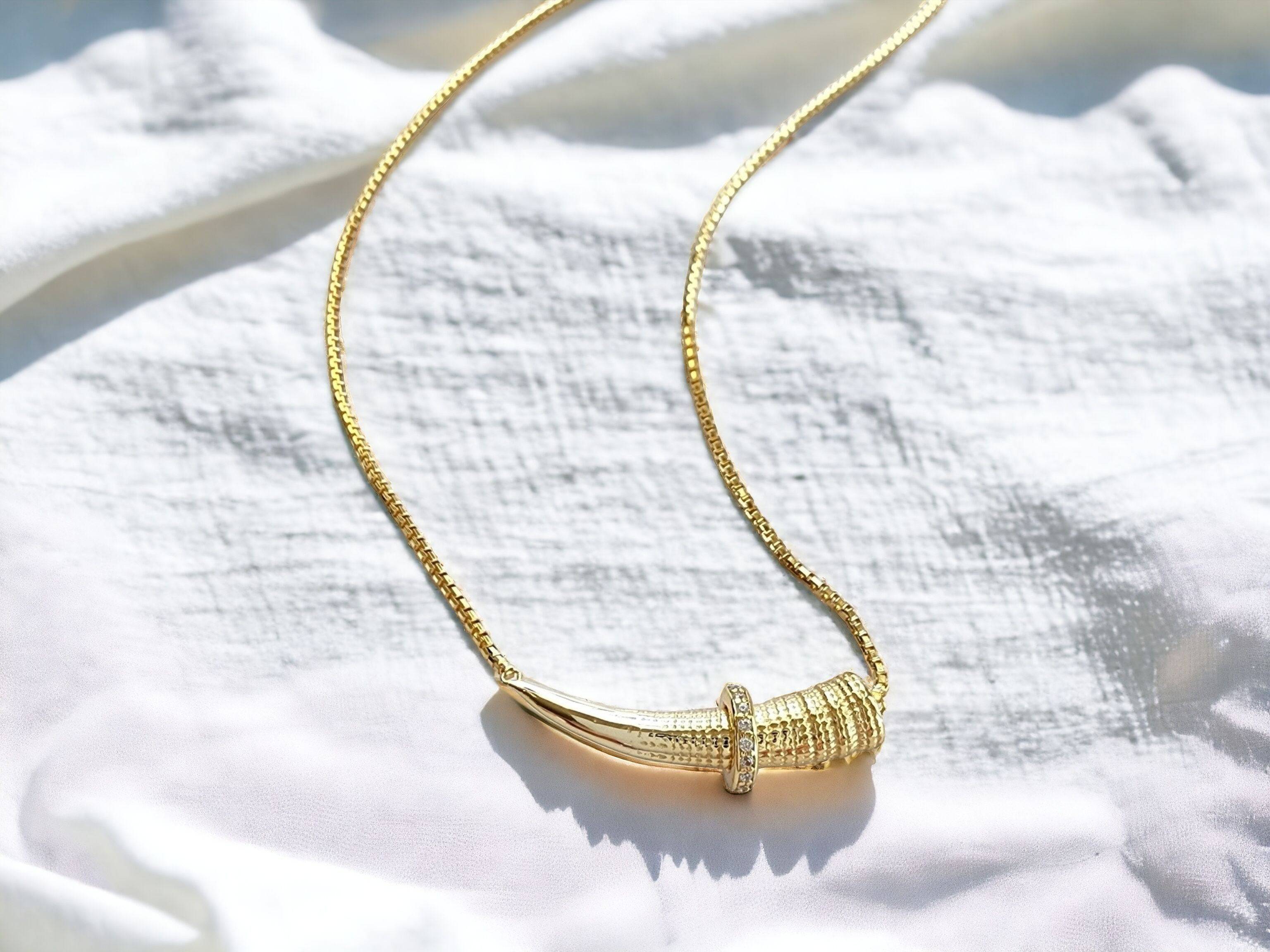 Everwild Wild Horn Gold Necklace with Crystal Slide on White Backdrop