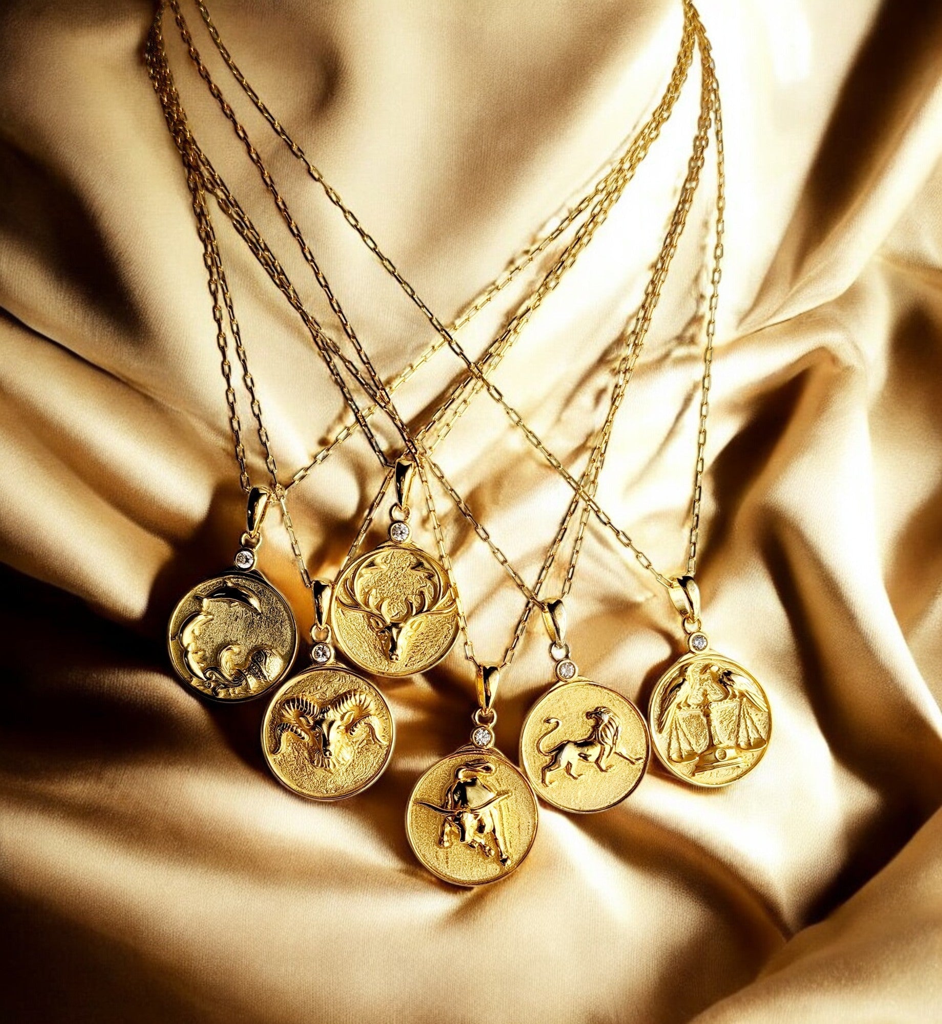 Gold Zodiac Virgo Antler Necklace in grouping of other Zodiac necklaces