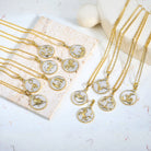 Gold chain necklaces with gold and silver zodiac pendants
