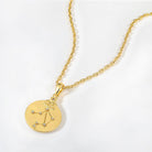 Gold necklace with a zodiac Virgo constellations pendant on a white background