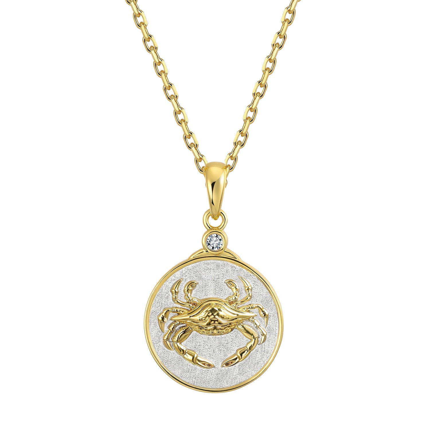 Gold and silver Zodiac Cancer crab pendant necklace on a white background