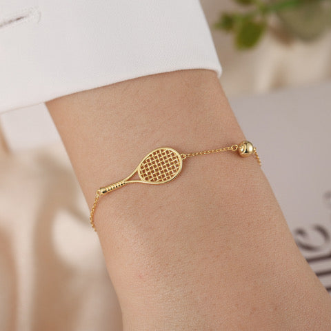 LoveMatch Tennis Ace Racquet and Ball on Gold Chain Bracelet on model