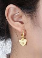 Saints & Saviors Crown Shield Huggie Earrings